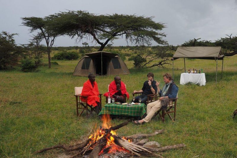 Tourists experiencing Maasais Culture and Bonfire 